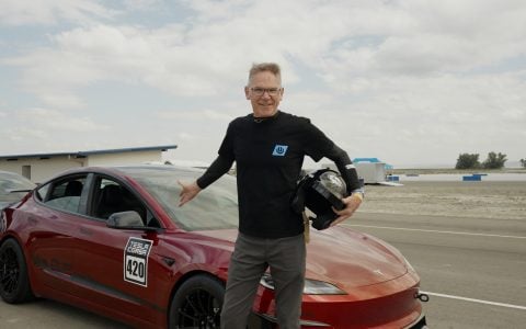 Randy Pobst in front of the UP Model 3 Performance Red Rocket Track Car