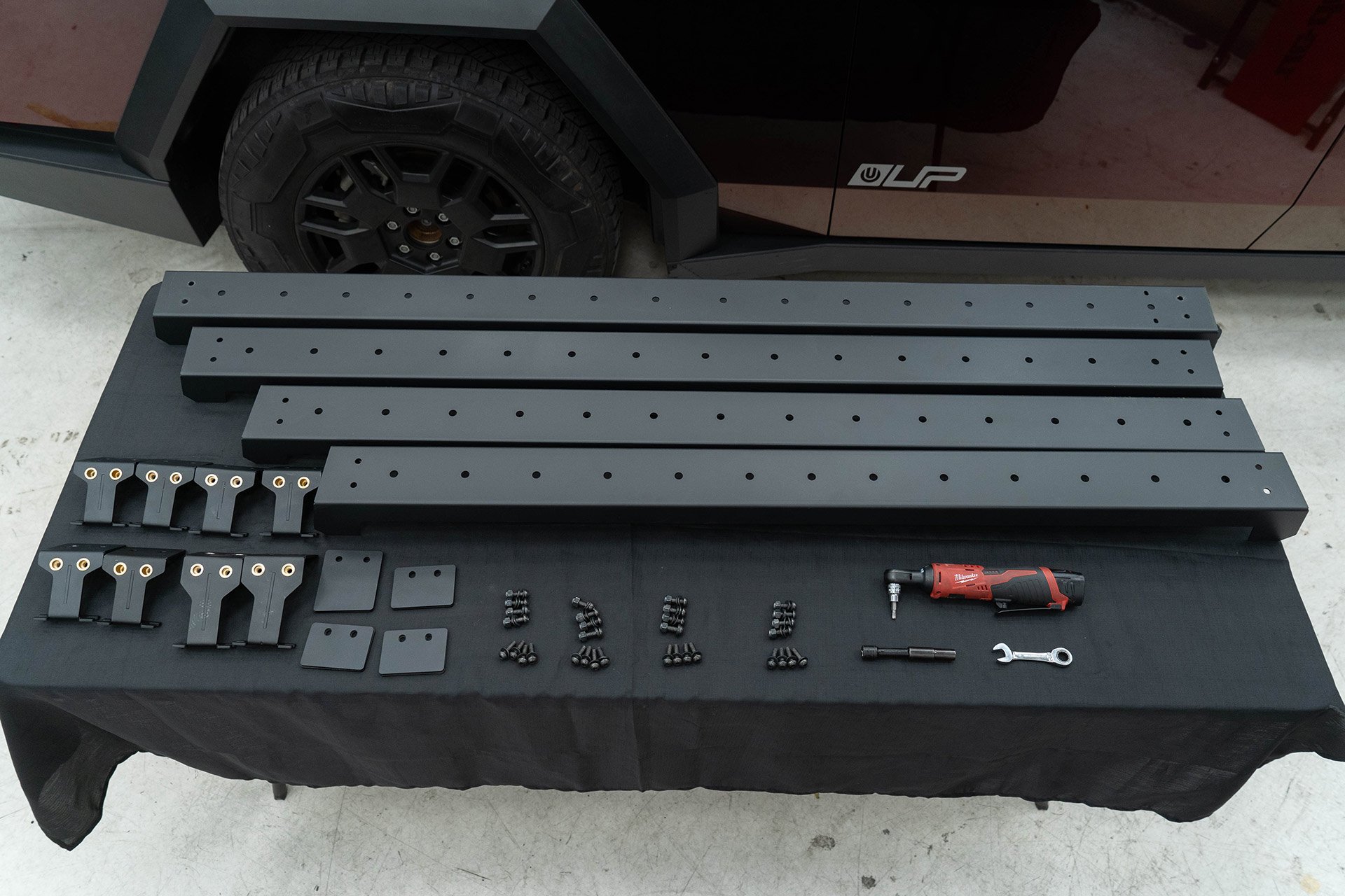 Tesla Cybertruck UP INVINCIBLE HD Roof Rack and MOLLE Panel - Installation 12