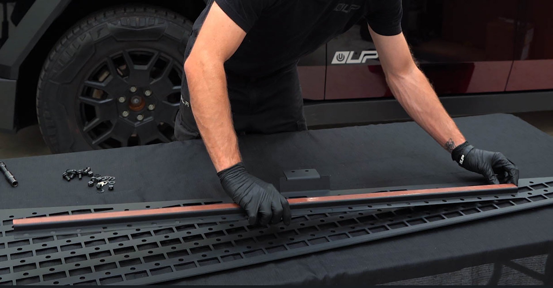 Tesla Cybertruck UP INVINCIBLE HD Roof Rack and MOLLE Panel - Installation 31