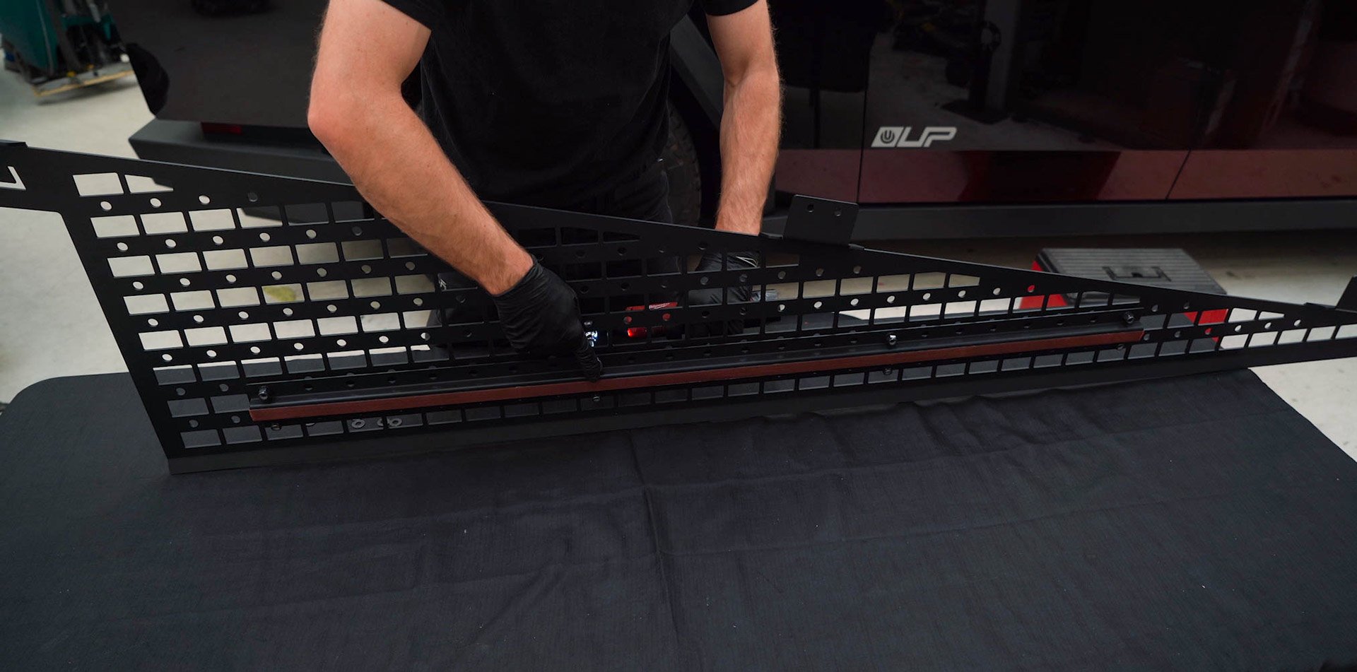 Tesla Cybertruck UP INVINCIBLE HD Roof Rack and MOLLE Panel - Installation 38