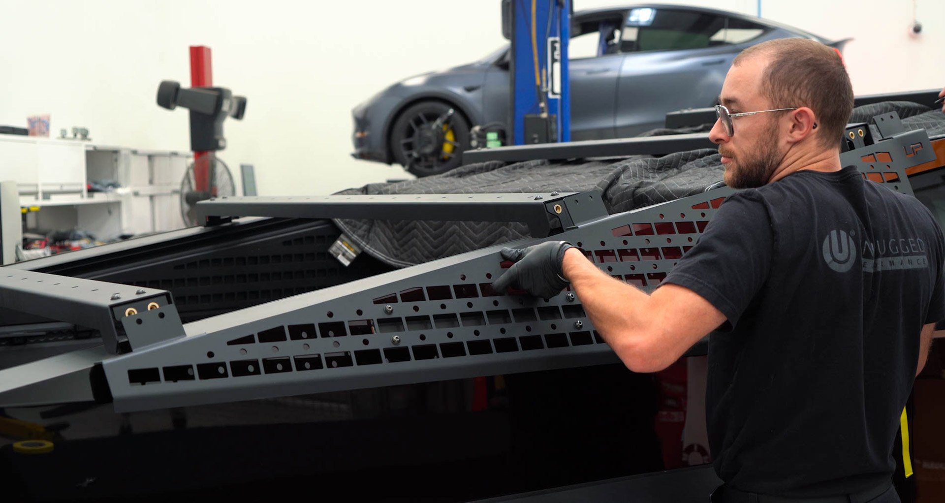 Tesla Cybertruck UP INVINCIBLE HD Roof Rack and MOLLE Panel - Installation 41