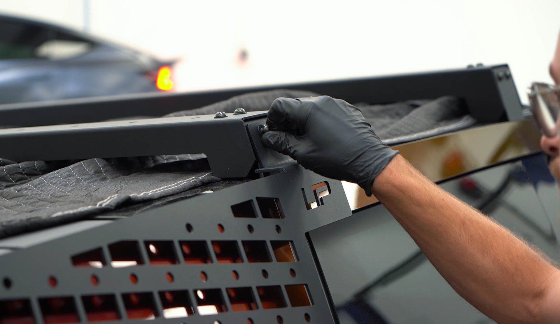 Tesla Cybertruck UP INVINCIBLE HD Roof Rack and MOLLE Panel - Installation 43