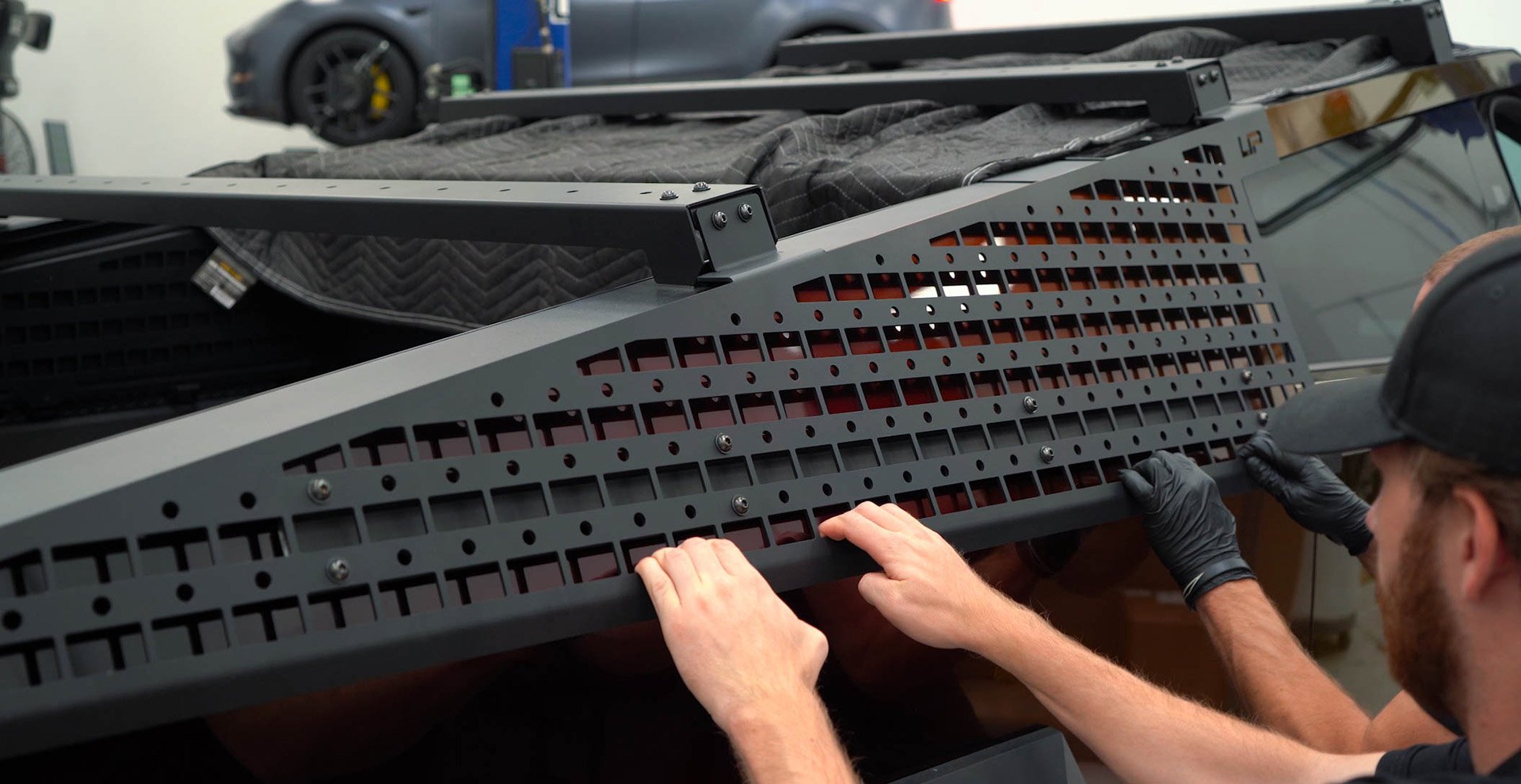 Tesla Cybertruck UP INVINCIBLE HD Roof Rack and MOLLE Panel - Installation 47