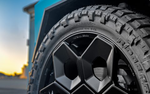 Gloss Sky Blue Wrapped Tesla Cybertruck on 24 inch CYBRHEX wheels in Satin Black