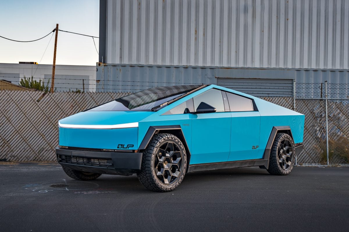 Gloss Sky Blue Wrapped Tesla Cybertruck on 24 inch CYBRHEX wheels in Satin Black