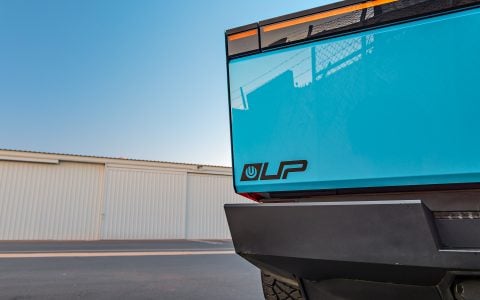 Gloss Sky Blue Wrapped Tesla Cybertruck on 24 inch CYBRHEX wheels in Satin Black